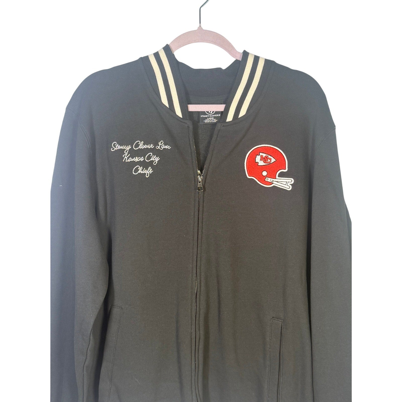 Stoney Clover Kansas City Chiefs women’s varsity jacket in black, large size, with team logo and varsity style details.
