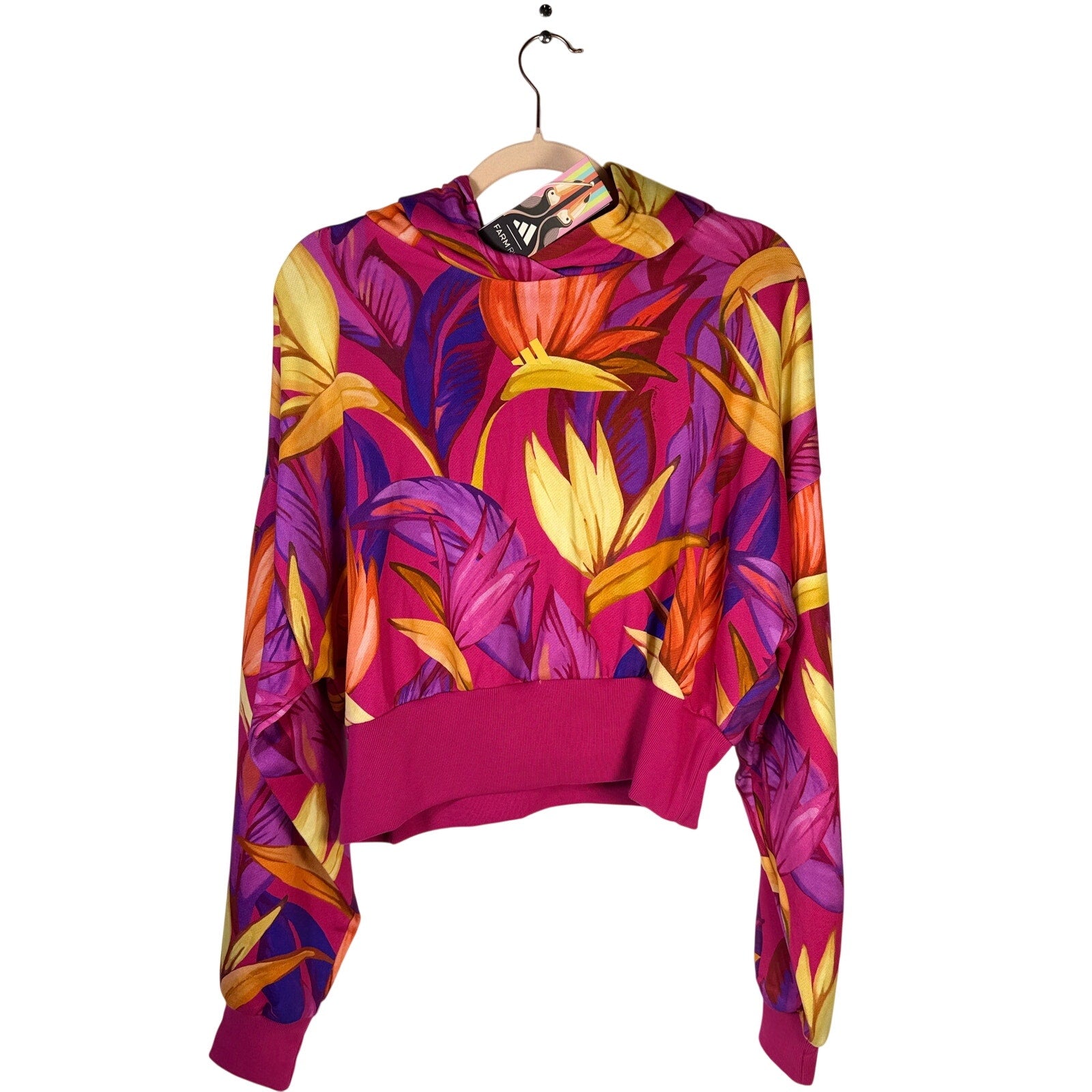 Adidas x FARM Rio women's tropical floral cropped hoodie in pink and multicolor, size XL, with vibrant floral pattern.