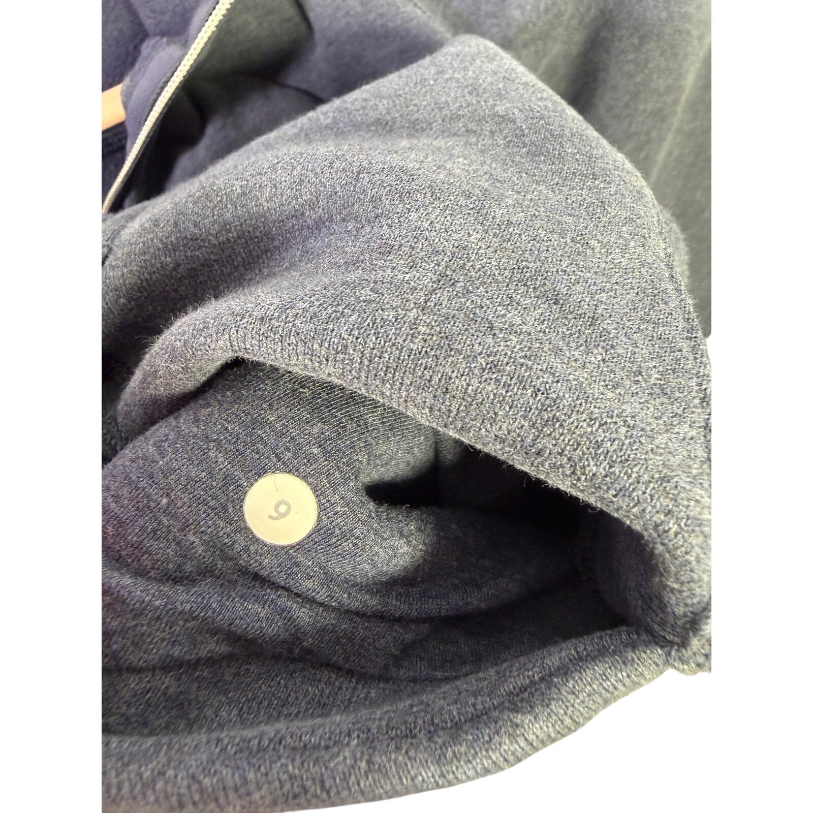 Lululemon women’s Heathered Blue Scuba Full-Zip Hoodie, size 6, featuring a soft, cozy fabric and a full front zipper.