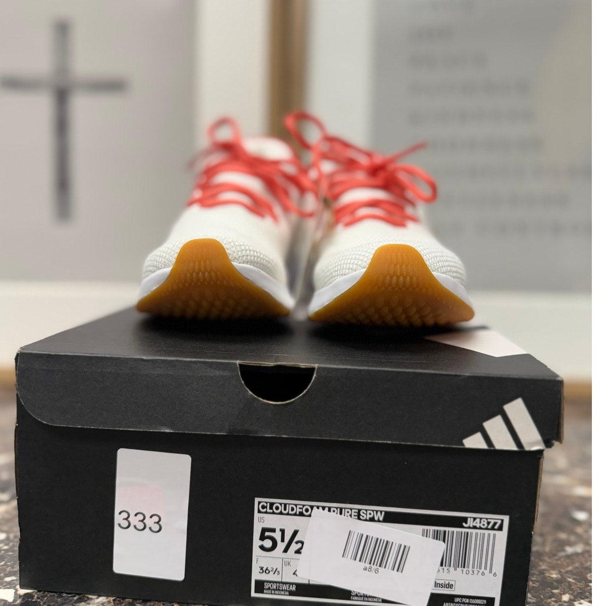 Adidas Cloudfoam Pure SPW women's sneakers in size 5.5, featuring a sleek design and cushioned sole.