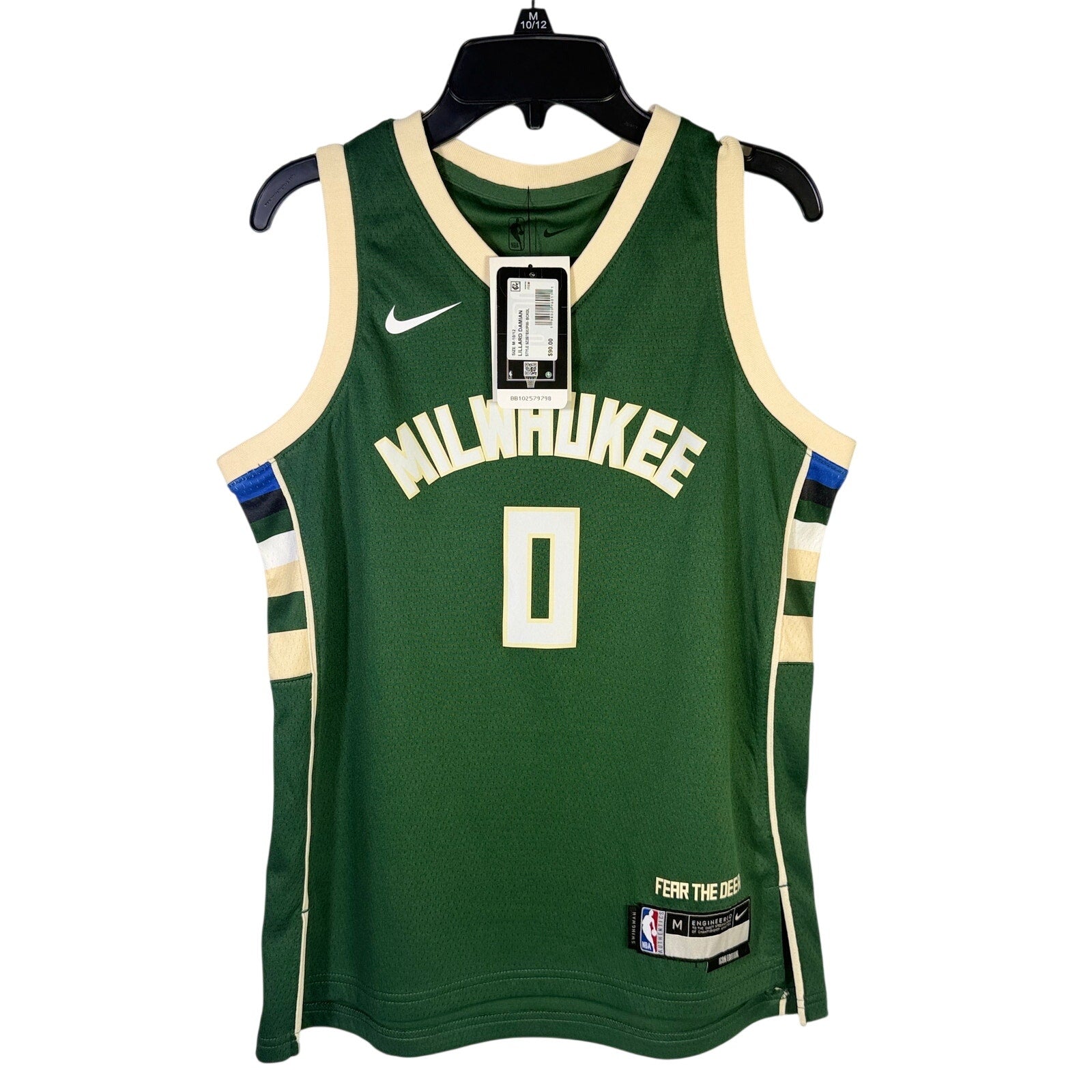 Nike Milwaukee Bucks Damian Lillard #0 youth swingman jersey in green, size M 10-12, with team logo and player number on front.