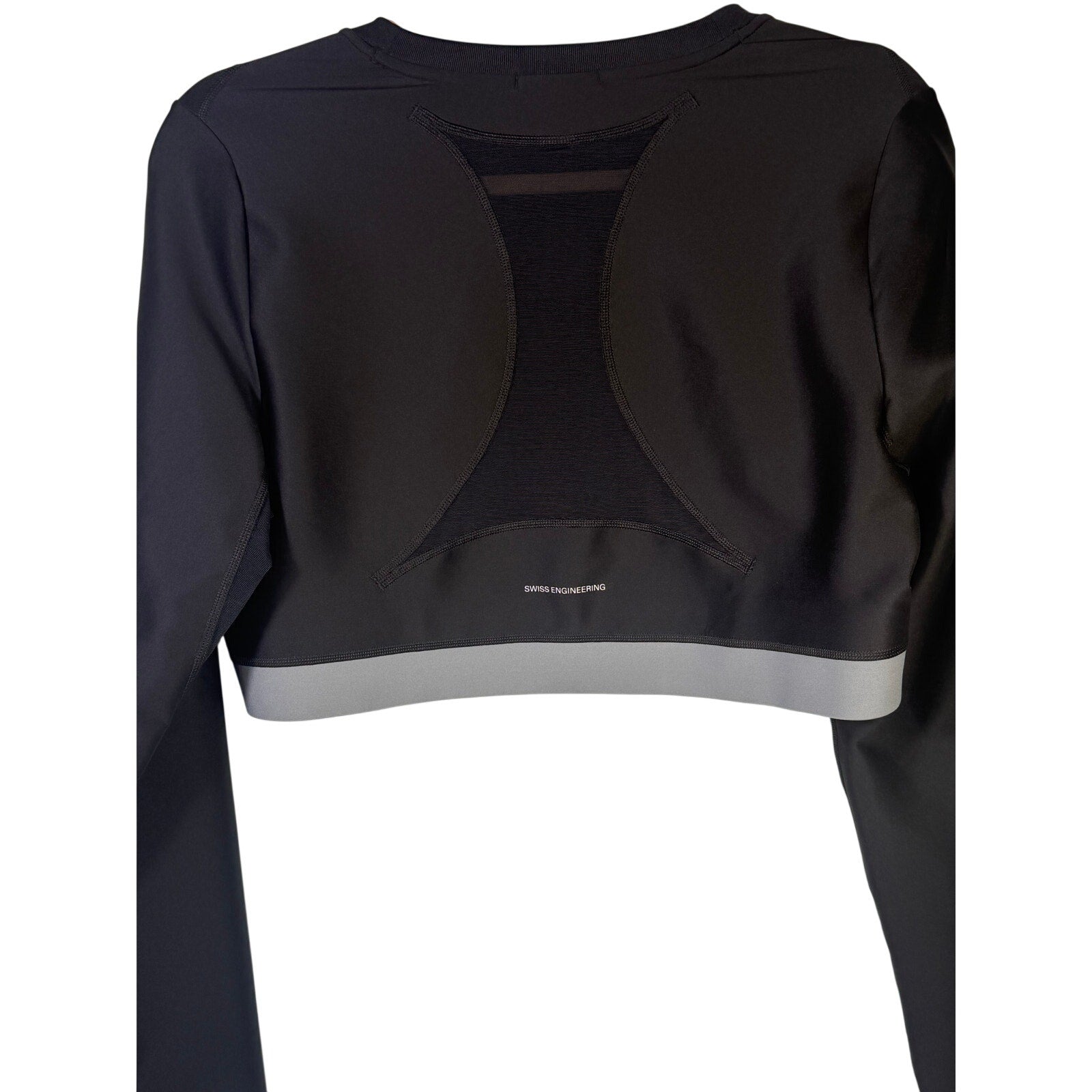 On Women's Train long-sleeve crop athletic top in black, size XL, featuring a fitted design and athletic fabric.