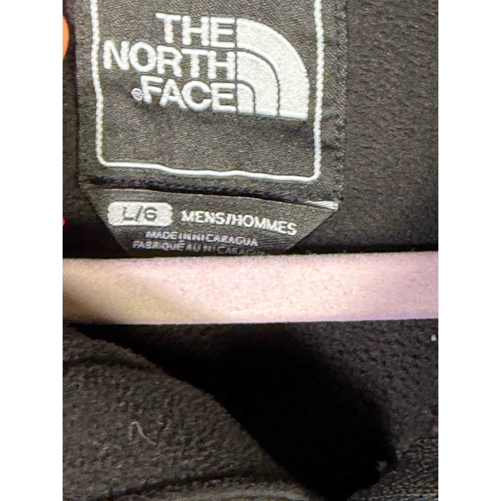 The North Face Men’s Large Black Softshell Full-Zip Fleece-Lined Jacket - label and size tag
