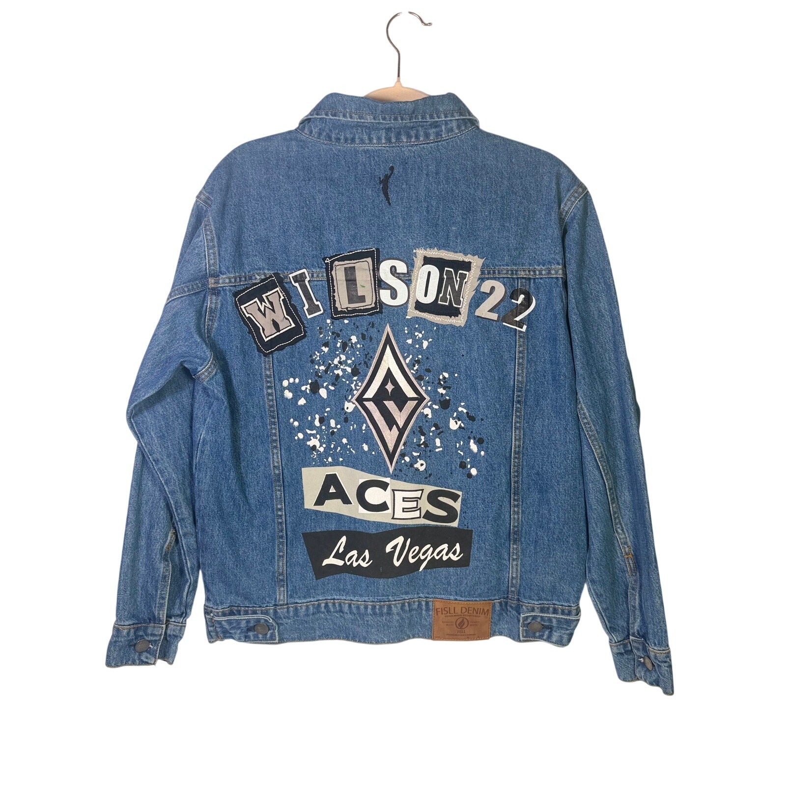 FISLL Las Vegas Aces Wilson denim jacket for women and men, medium size, new with tags, featuring team logo and classic design.