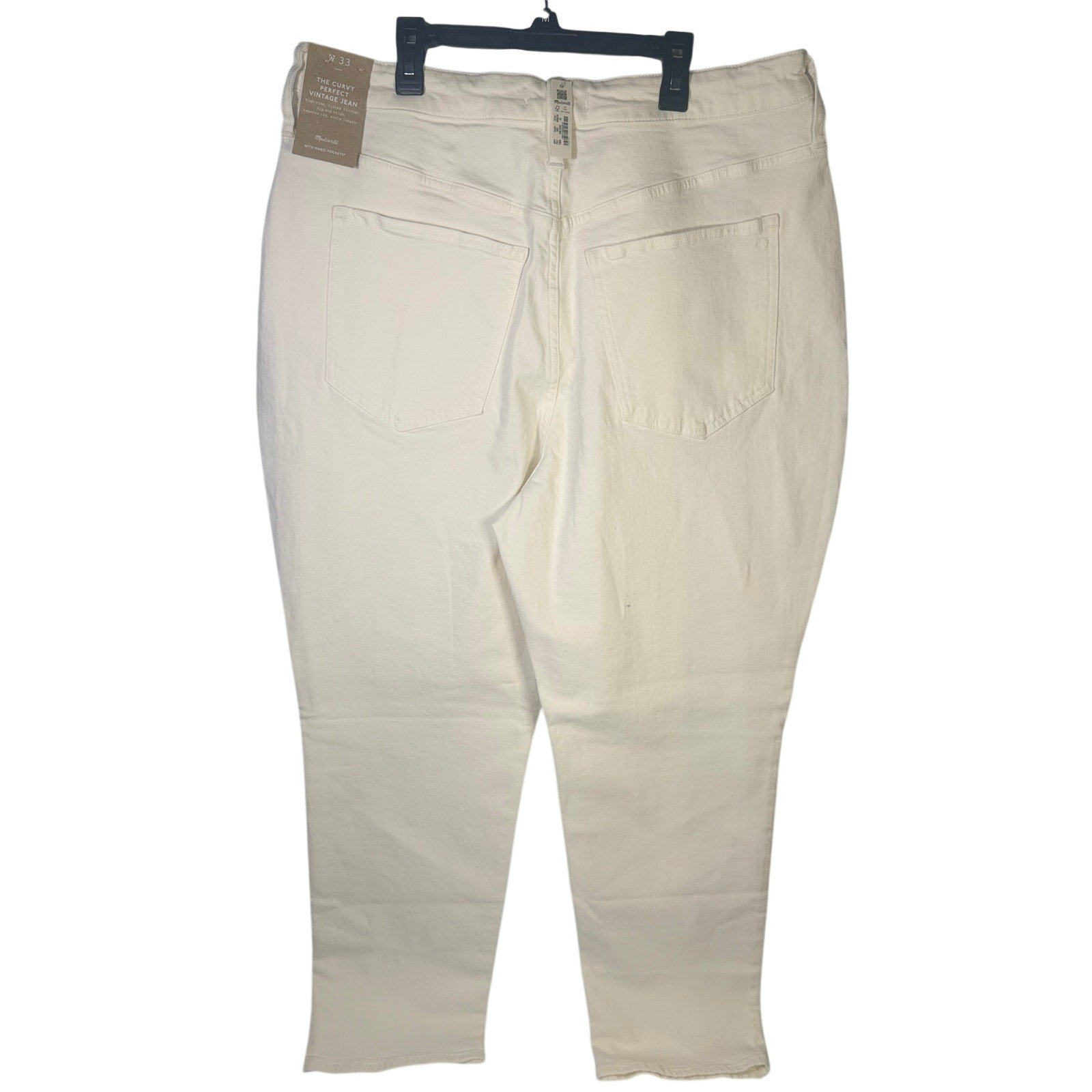 Madewell curvy vintage jeans for women, high-rise tapered fit in white, showcasing front view with pockets and high waist design.