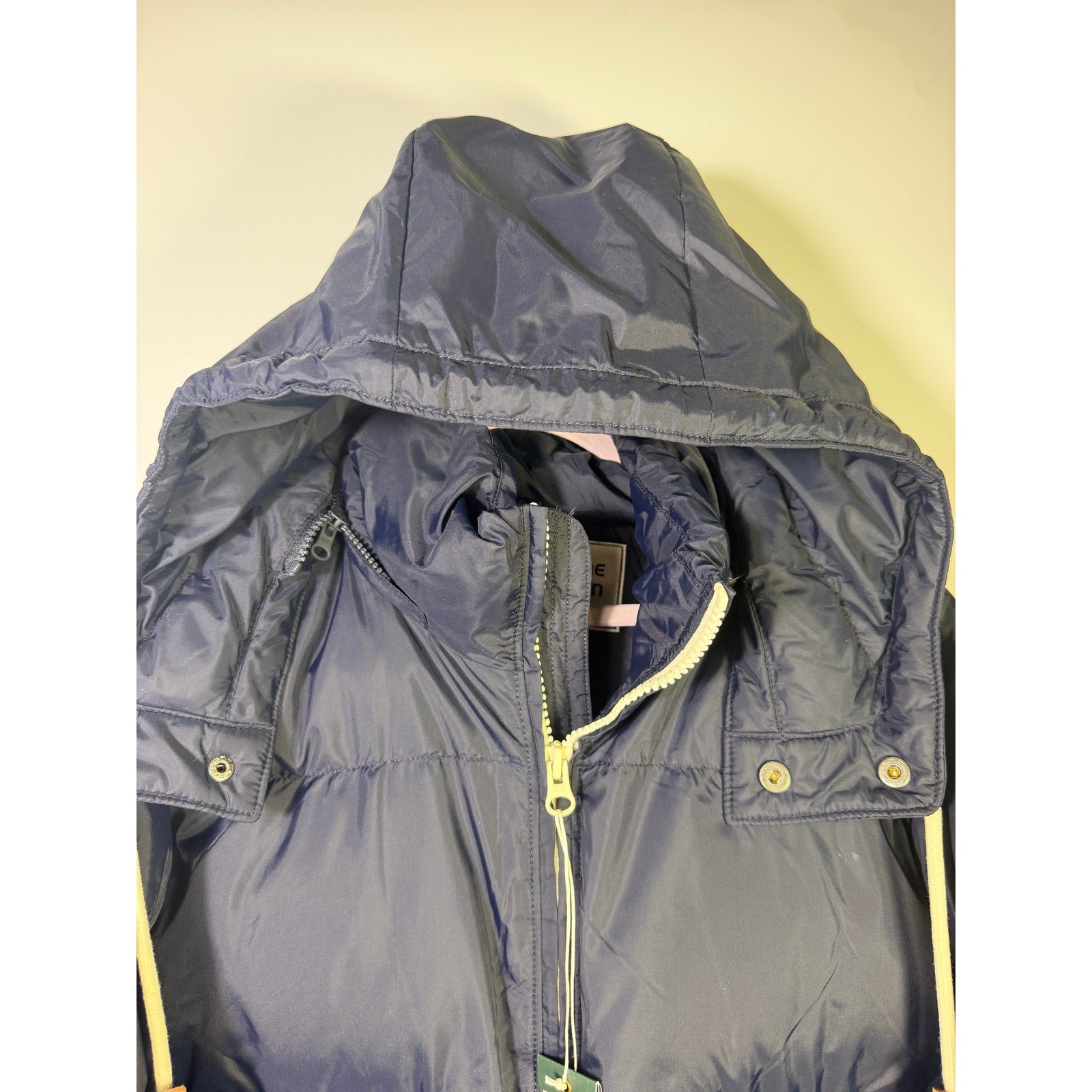 Alpine Design men's AD 1962 hooded puffer jacket in deep navy, size large, with insulated quilted design and front zipper.