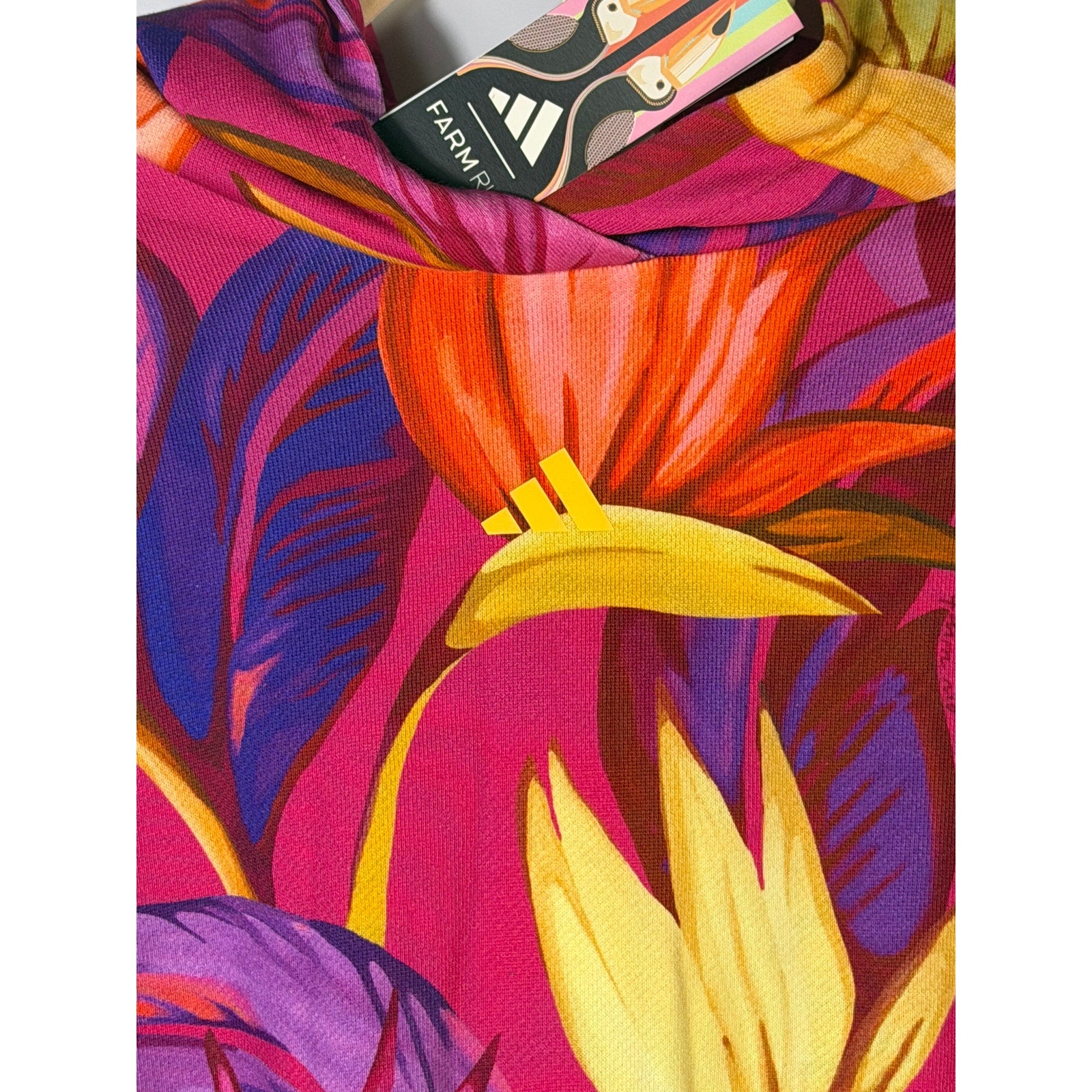 adidas x FARM Rio women's tropical floral cropped hoodie in pink and multicolor, size XL, new with tags, shown on a model