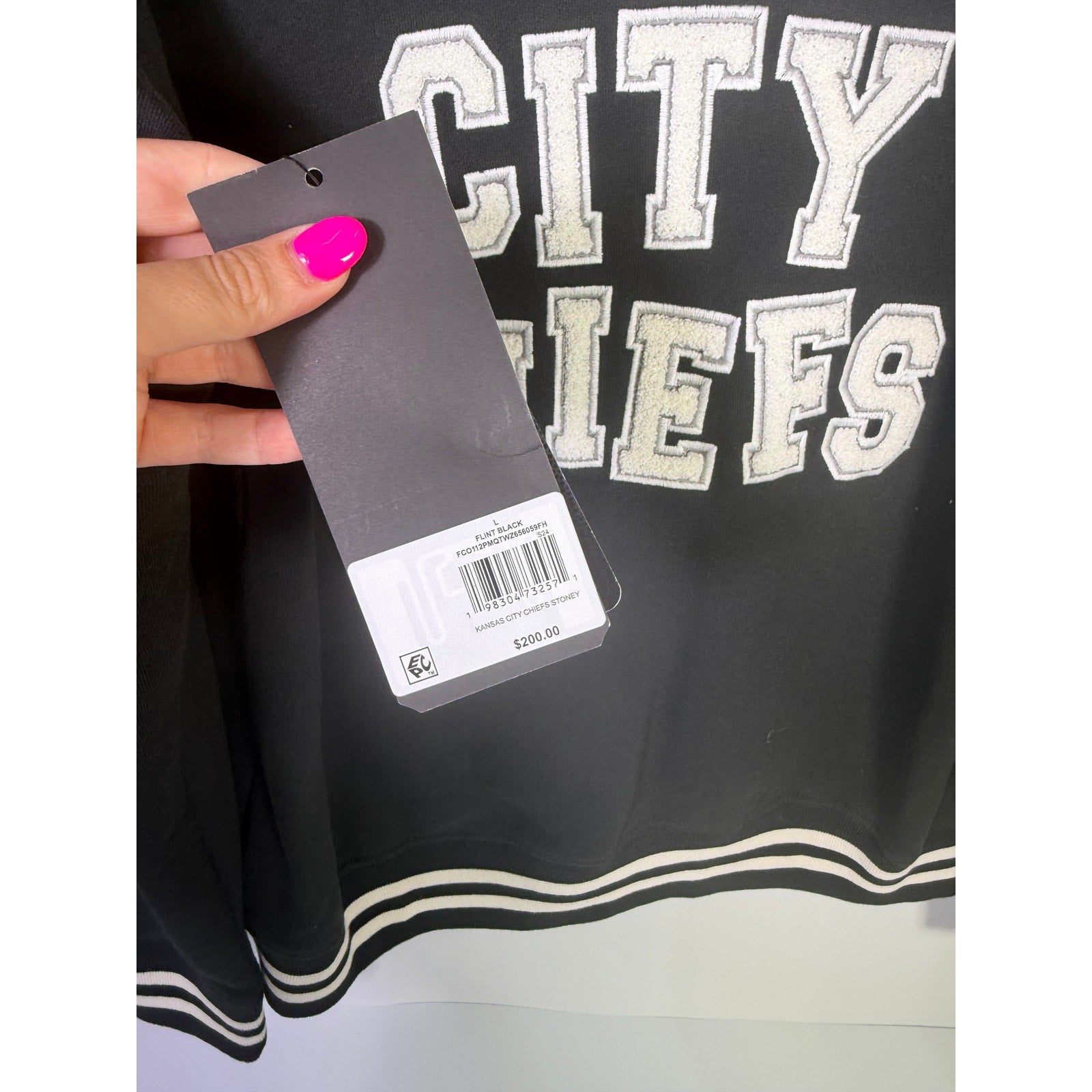 Stoney Clover Kansas City Chiefs women's varsity jacket in black, large size, with team logo and varsity style details.