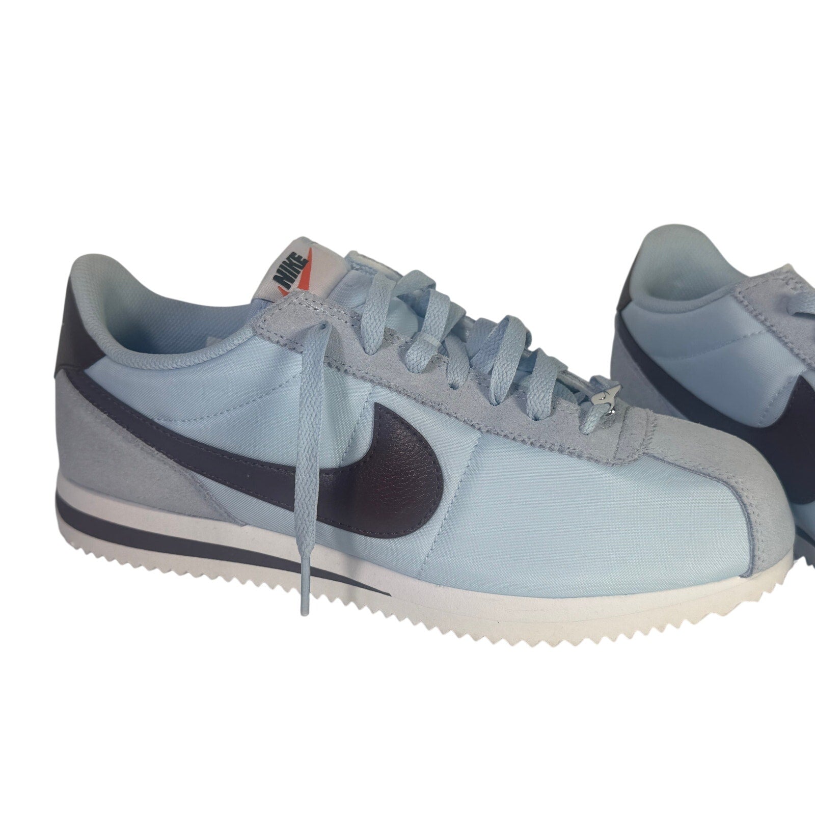 Nike Classic Cortez nylon men's sneakers in light blue and burgundy, size 8.5, featuring a sleek sporty design.