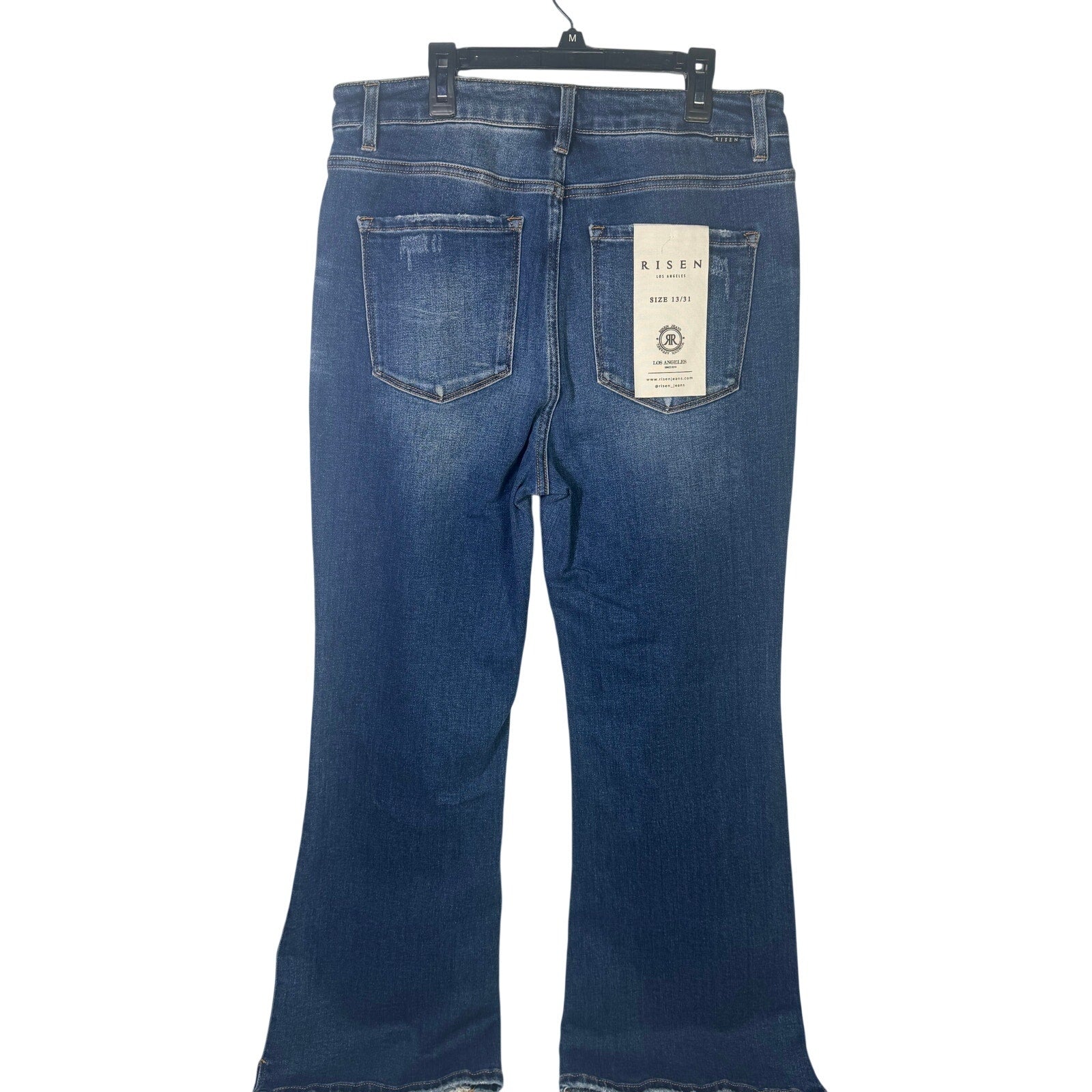 Risen Jeans women's size 13/31 dark wash distressed flare jeans, front view showing high-rise fit and frayed details.